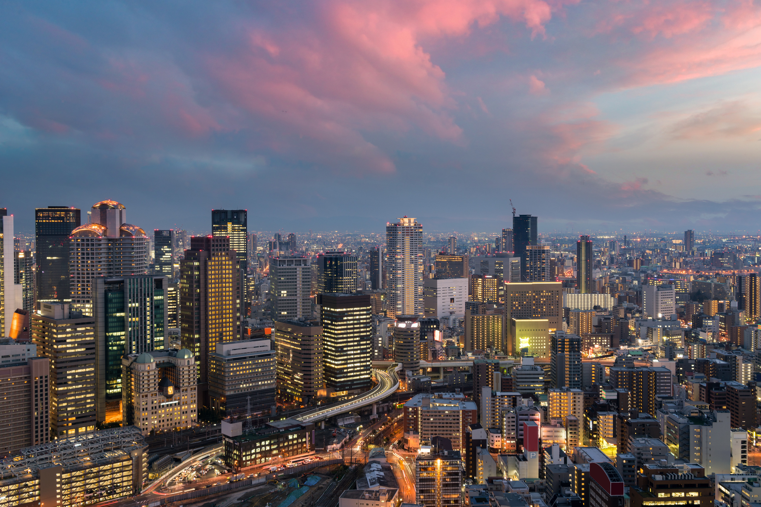 Osaka downtown city skyline at the landmark Umeda District in Osaka, Japan.